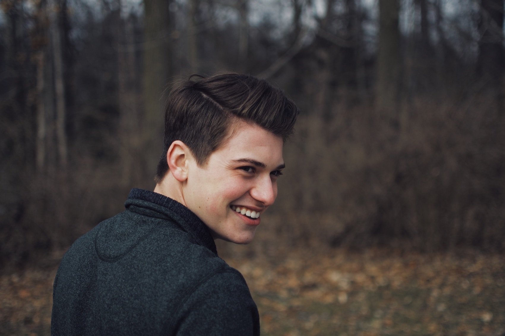 Man in Woods with Slight receding Hairline