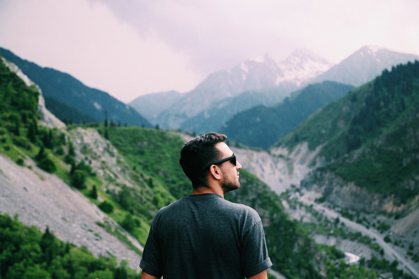 Male hair loss explained Man overlooking mountains