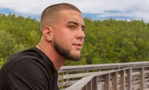 man with military buzz cut